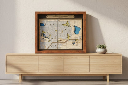 Framed map of Longmont, Colorado with a wooden border.