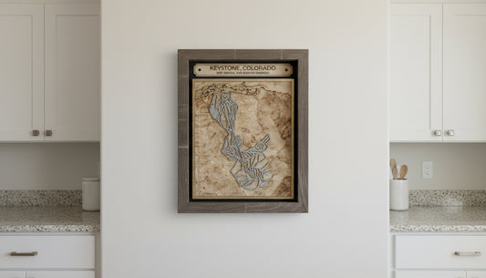 Framed map of Keystone, Colorado on a wooden surface