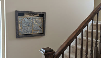 Framed map of Littleton, Colorado on a white surface with a beige wall background